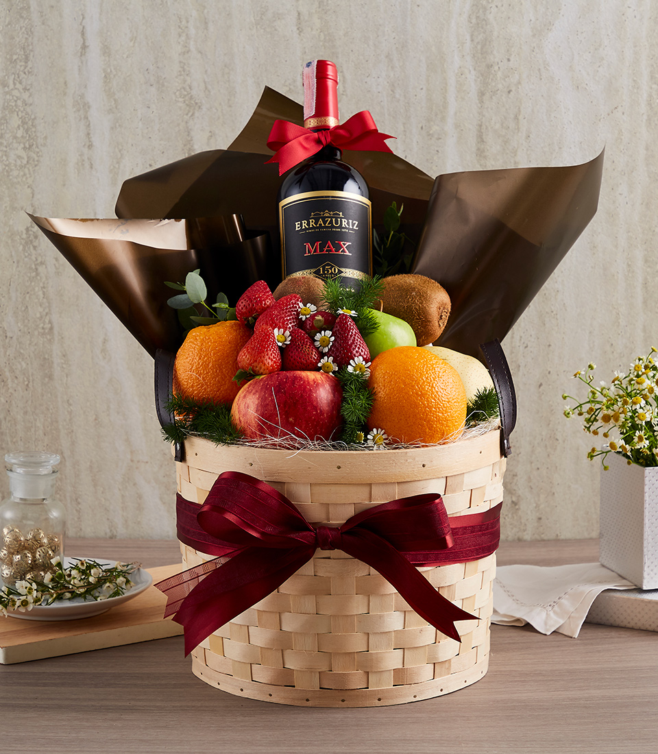 Fruitful Delights: Red Wine and Assorted Fruits in a Woven Basket