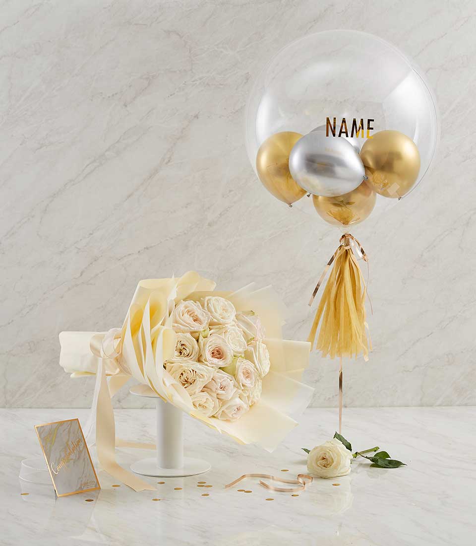 Delight your loved ones with our exquisite White Flowers Gold Balloon Combo Gift, a perfect blend of elegance and joy.