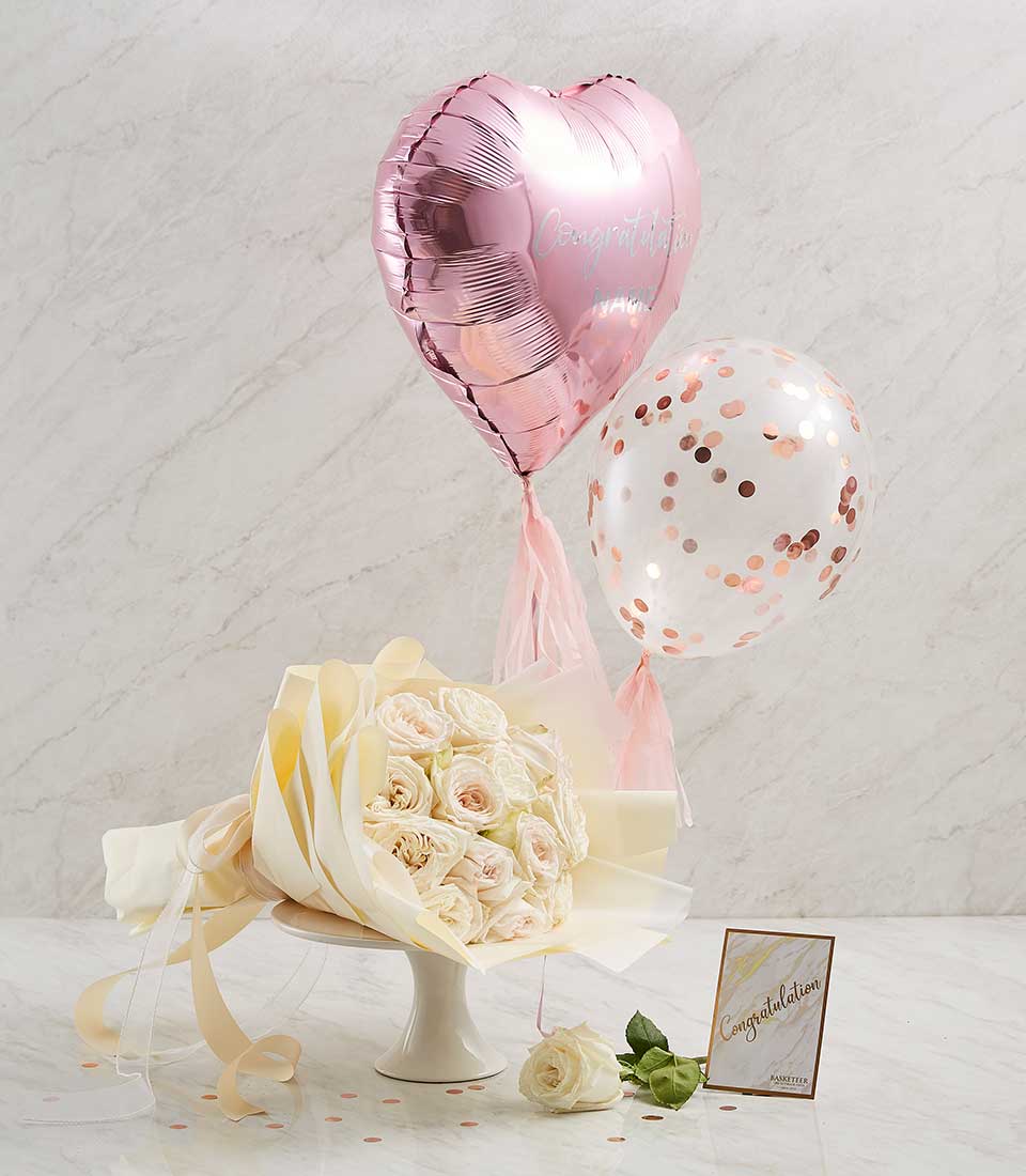 Surprise your special someone with our Heart Pink Balloons White Flowers Combo Gift, a beautiful expression of love and affection.
