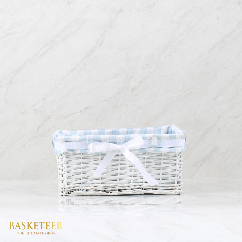White Square Wicker Basket Lined With Light Blue Checked Fabric Inside