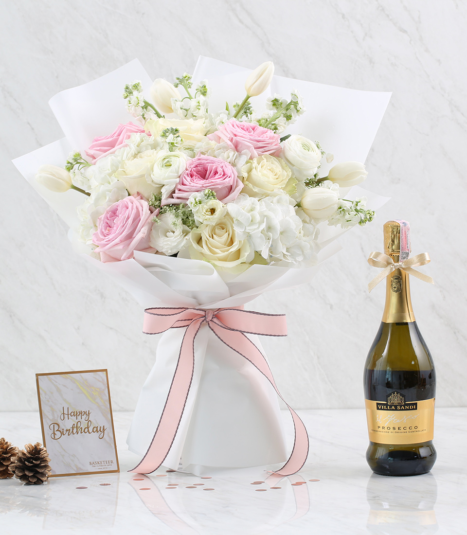 Experience the epitome of sophistication with our Floral Elegance & Wine Gift Set! Delight your senses with a stunning arrangement of fresh blooms paired harmoniously with a bottle of exquisite wine. Whether it's a gesture of appreciation, a celebration, or simply to spread joy, this elegant gift set is sure to leave a lasting impression. Order now to elevate your gifting experience!
