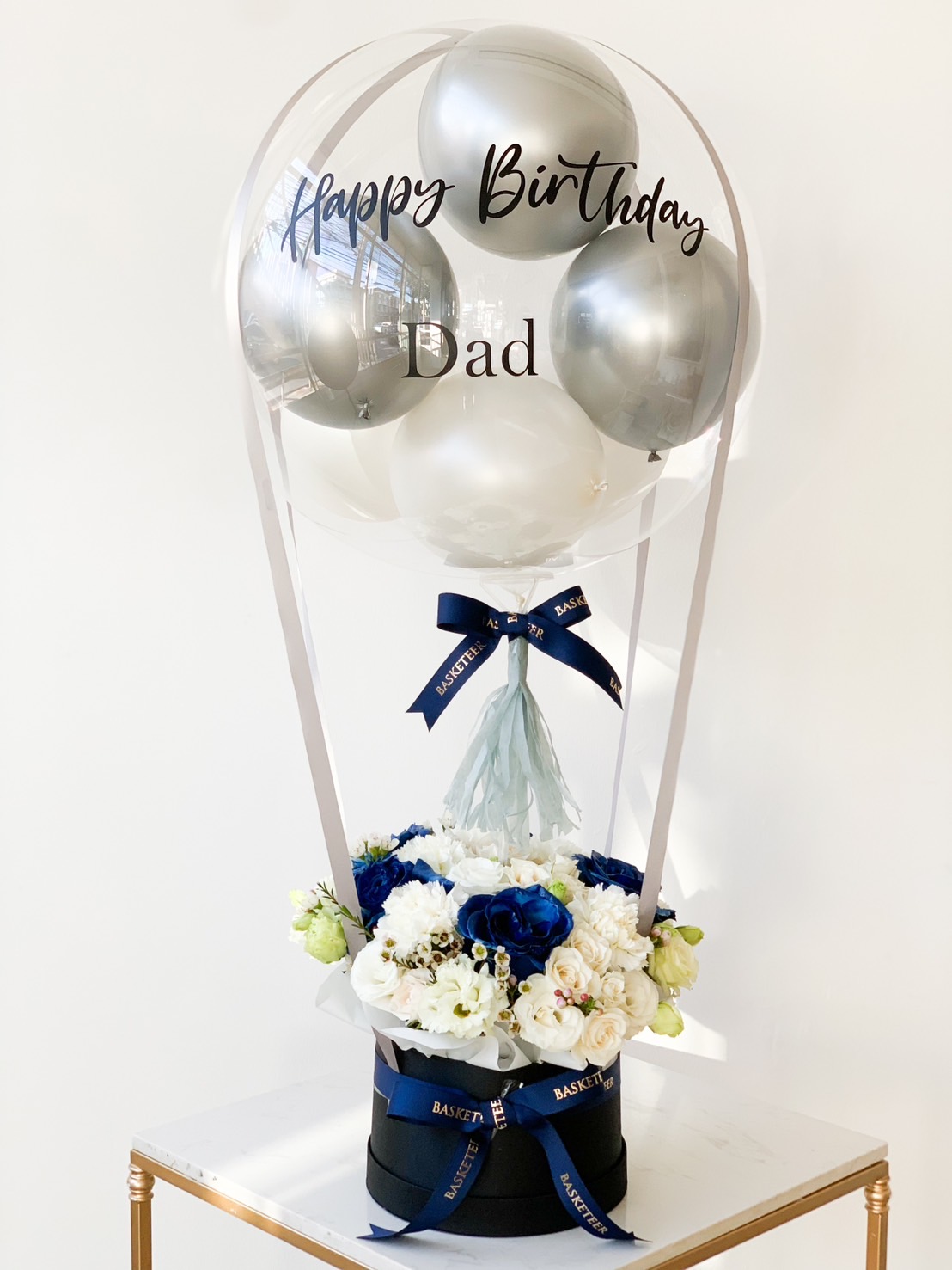 happy birthday Balloon With Blue and White Roses In Black Box.