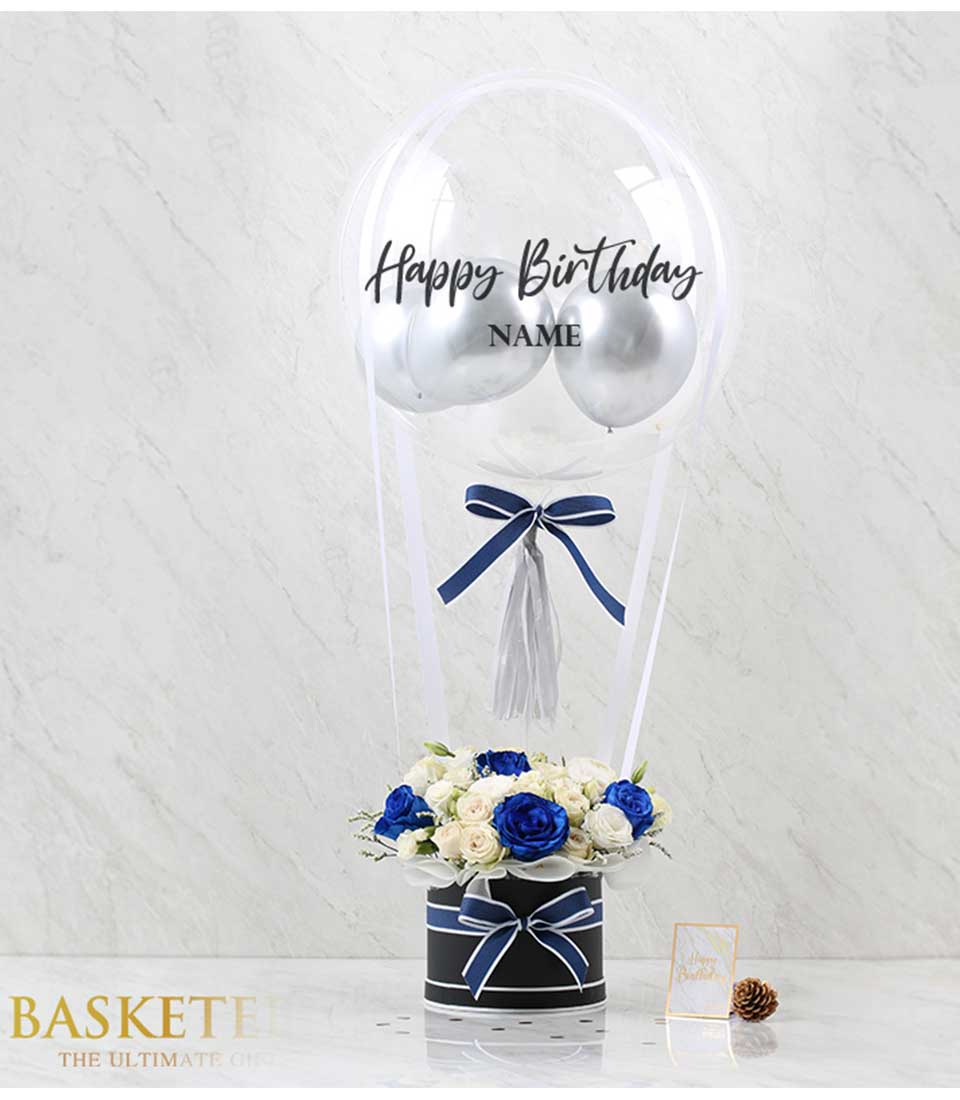 Experience the elegance of our White Blue Roses Balloon Box Set, featuring beautiful white and blue roses complemented by a festive balloon. Order now for a delightful surprise!