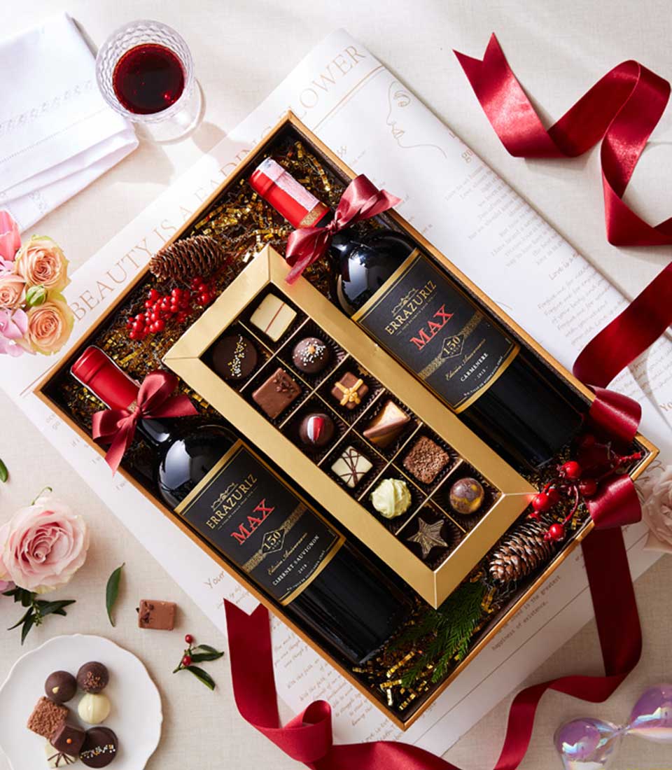 Experience enchantment with our beautifully curated wine and chocolate box set, perfect for indulging in exquisite moments of luxury and delight.