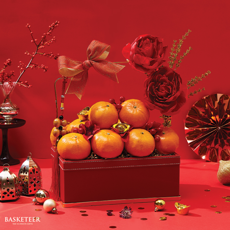 Mandarin Orange Chinese New Year Gift In The Red Basket With a Bow