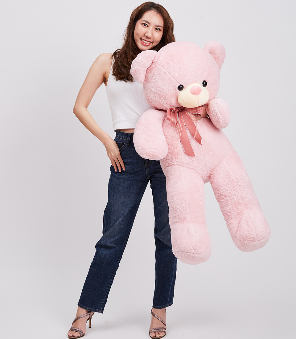 Explore our delightful light pink teddy gift, a big teddy bear perfect for her or any special occasion. Bring joy with this adorable gift!