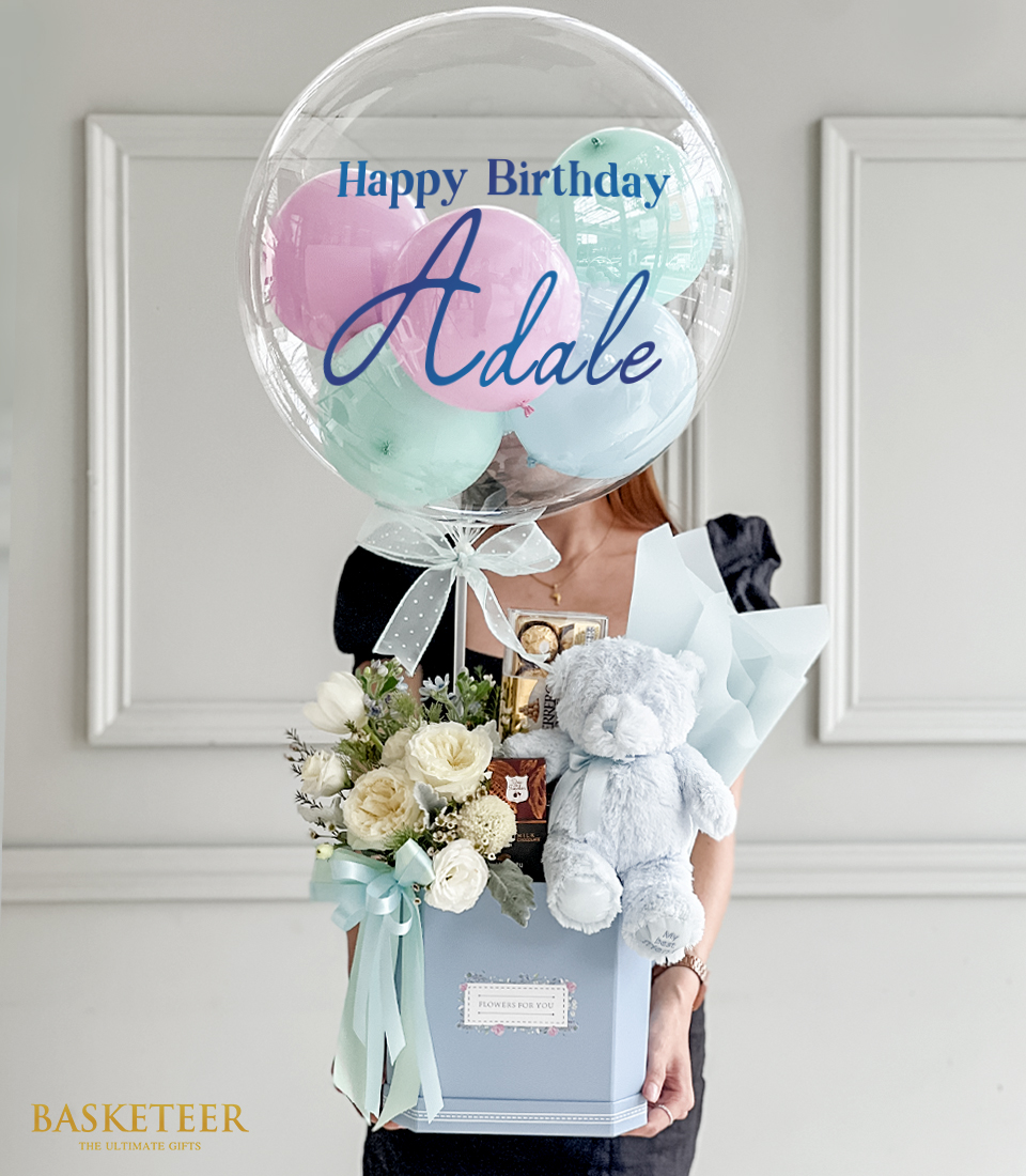 Experience the elegance of our Blue Tone Balloon With White Roses Gift Set! This stunning arrangement features delicate white roses complemented by vibrant blue balloons, creating a captivating visual contrast. Complete with a cuddly teddy bear and indulgent chocolates, this gift set is perfect for expressing love, gratitude, or celebration. Order now and delight someone special with this exquisite gift ensemble!