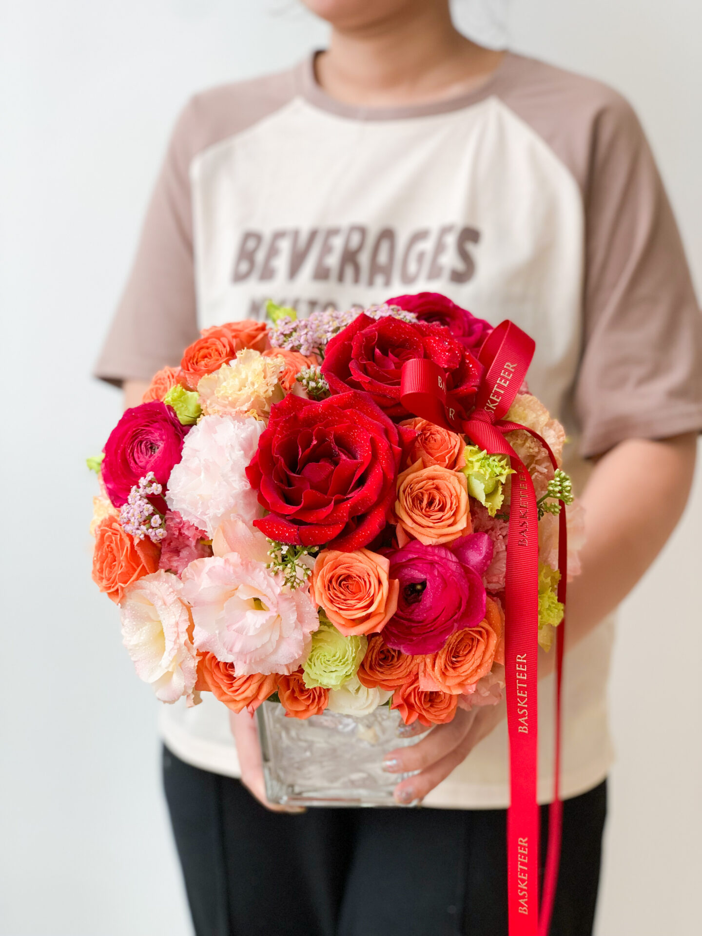 A person in a beige and brown 