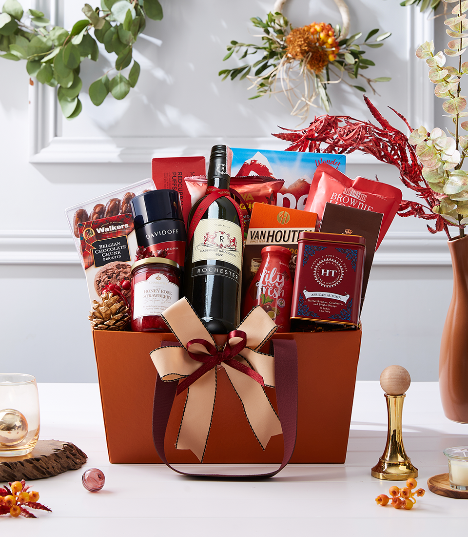 Indulge in our Wine & Snacks Delight Hamper, featuring a curated selection of fine wines and gourmet snacks. Perfect for any occasion!