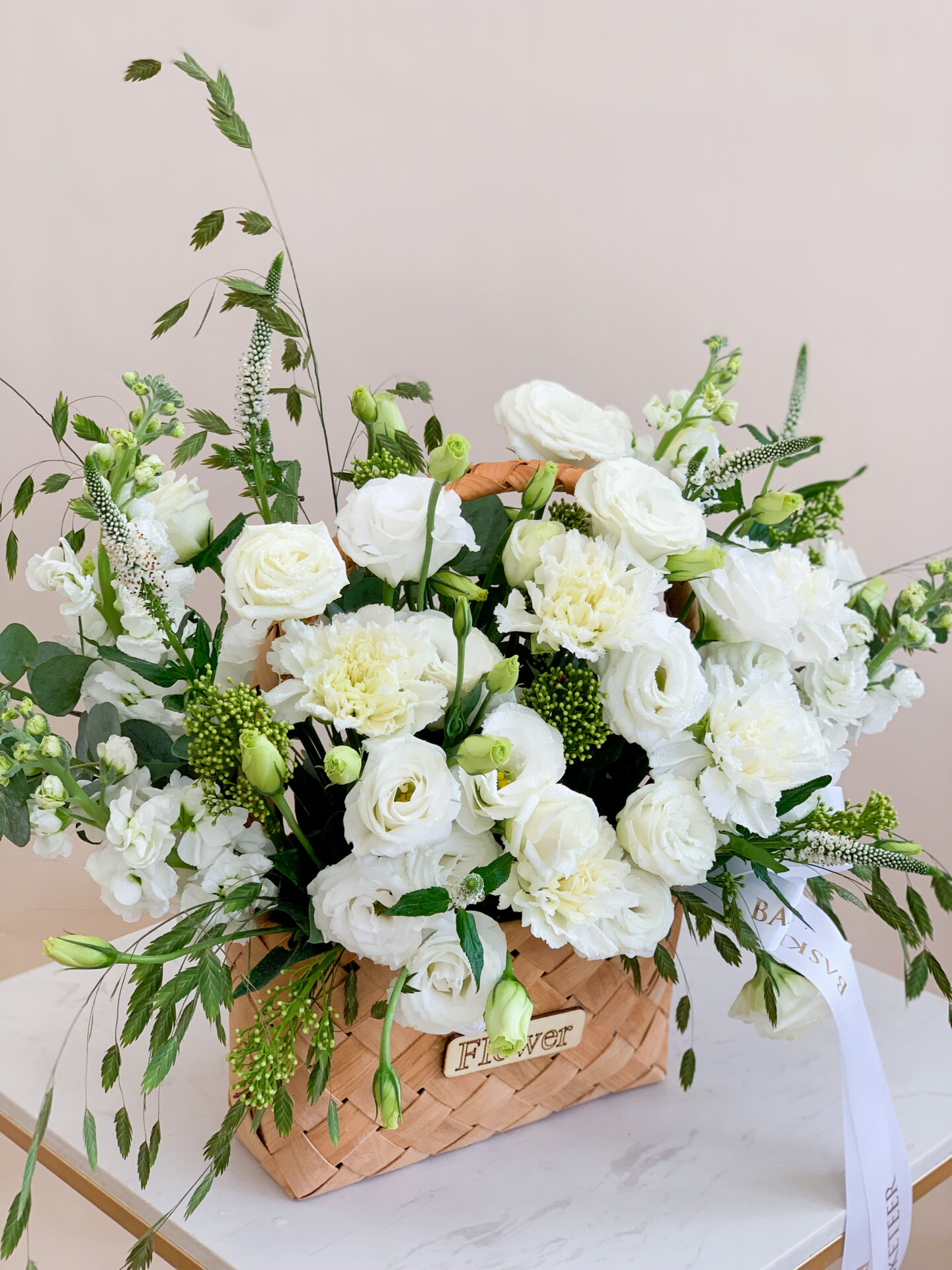 A luxurious wicker basket adorned with a sophisticated 