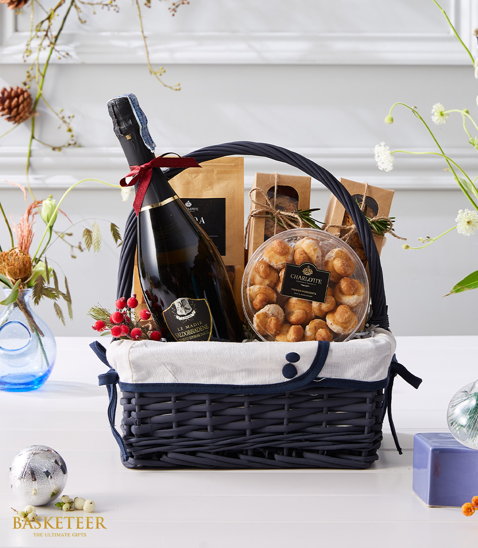 Indulge in luxury with our Divine Wine & Sweet Basket, featuring a curated selection of exquisite wines and delectable sweets.