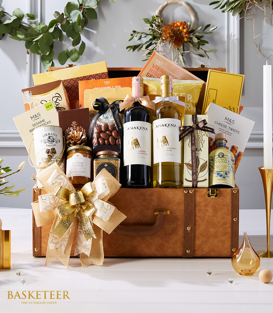 Indulge in luxury with our Deluxe Wine Duo in Leather Hamper with Gourmet Gift. This exquisite set features two bottles of premium wine nestled in a sophisticated leather hamper, accompanied by a selection of gourmet treats. Perfect for special occasions or treating someone special. Order now and elevate your gifting experience!