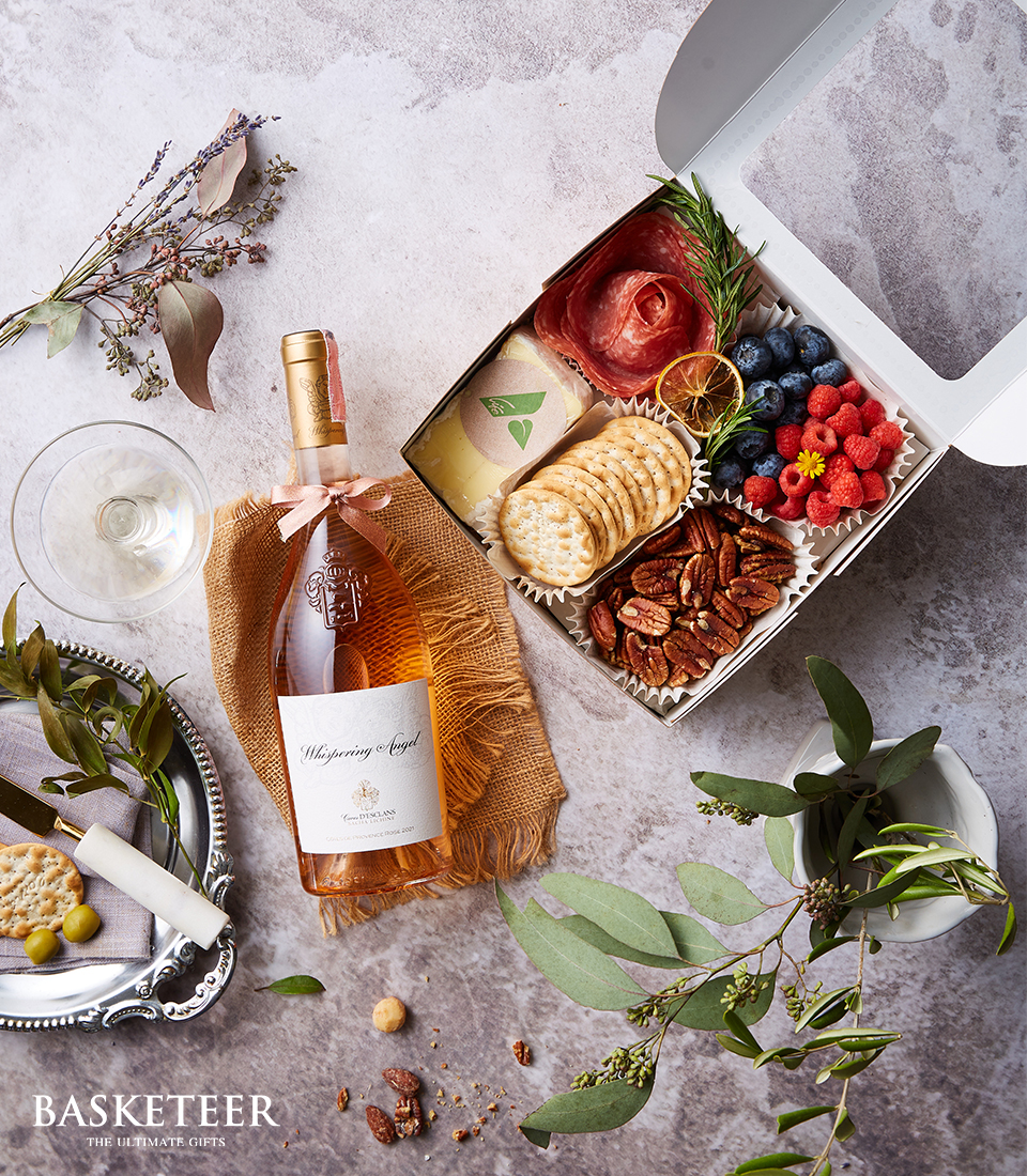 Discover the perfect balance of flavors with our Rosé Wine Charcuterie Gift. Hand-selected rosé wine paired with premium charcuterie delights. Order now for a delightful experience!