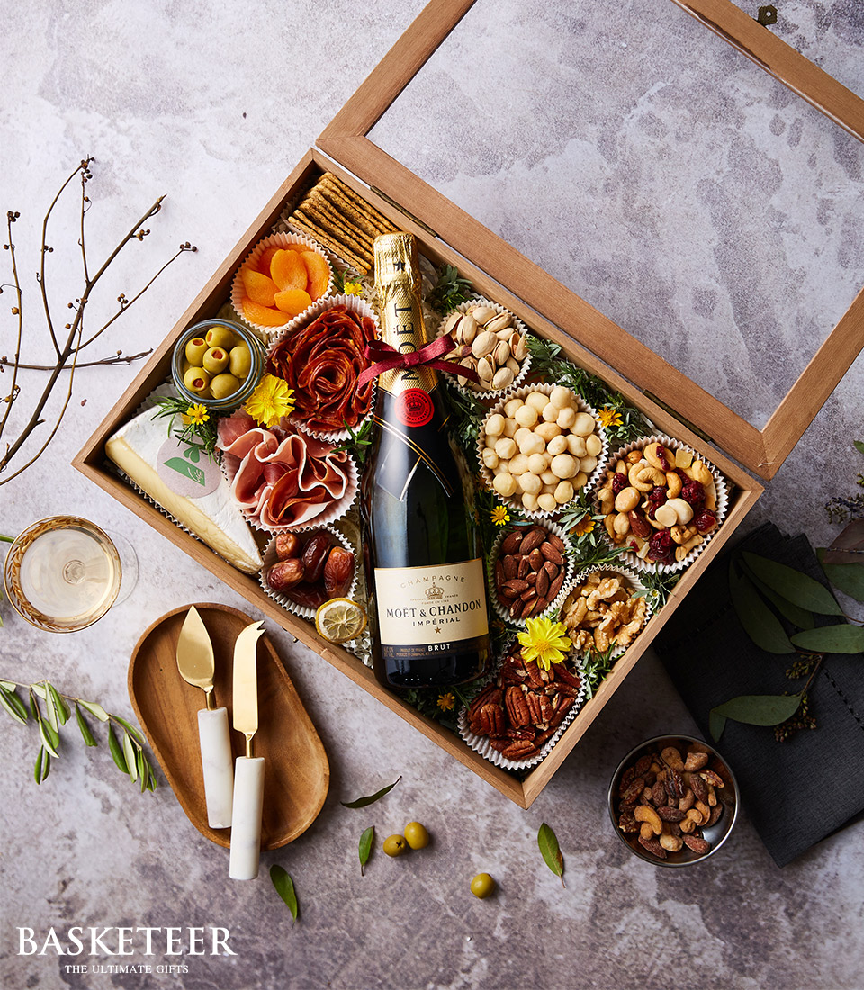 Discover the perfect pairing of Moet champagne and artisanal charcuterie in our exquisite gift box.