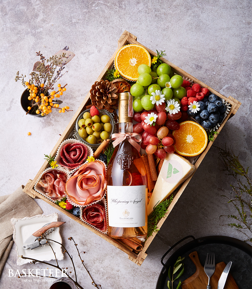 Experience a culinary journey with our Wine Feast Gift Box, featuring a curated selection of premium wines and gourmet delicacies.