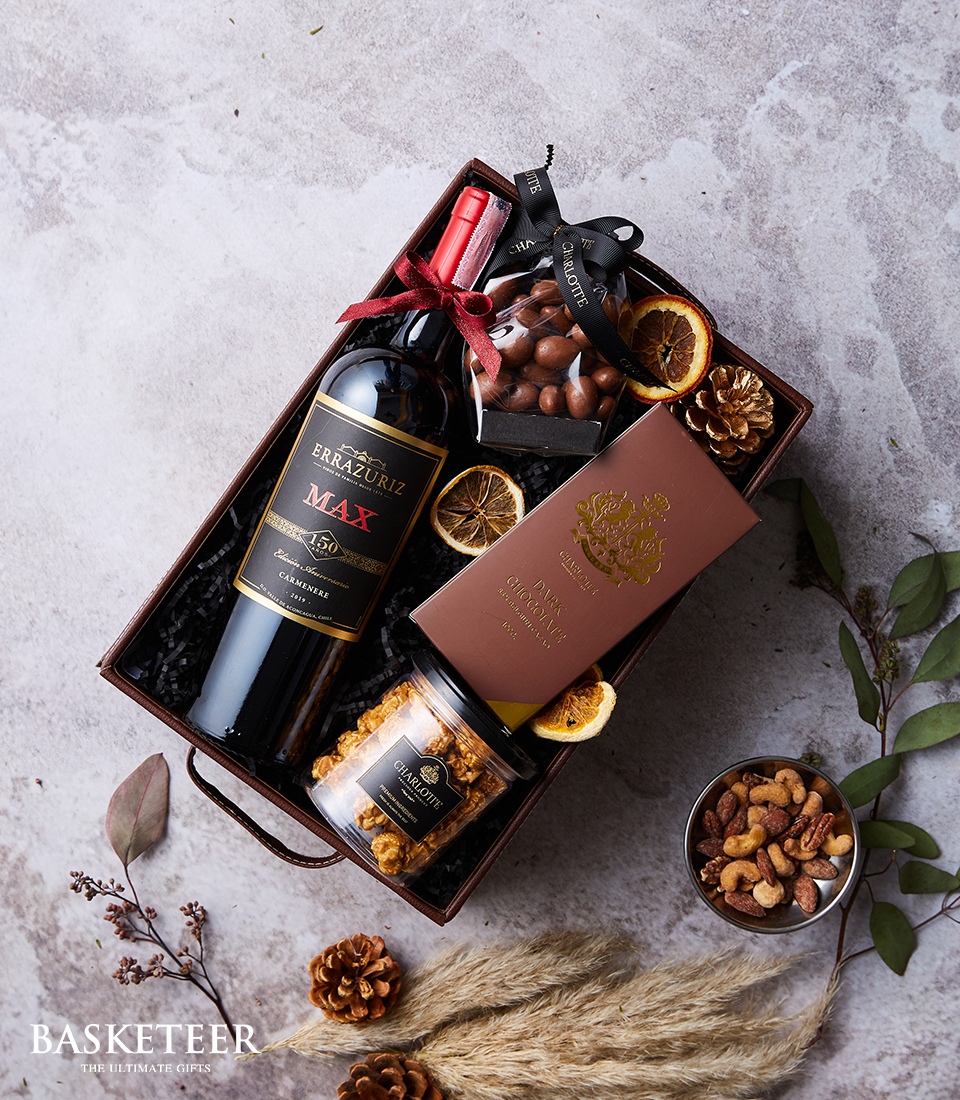 Explore our irresistible Chocolate Snacks Wine Gift, featuring premium chocolates, gourmet snacks, and a selection of fine wines.