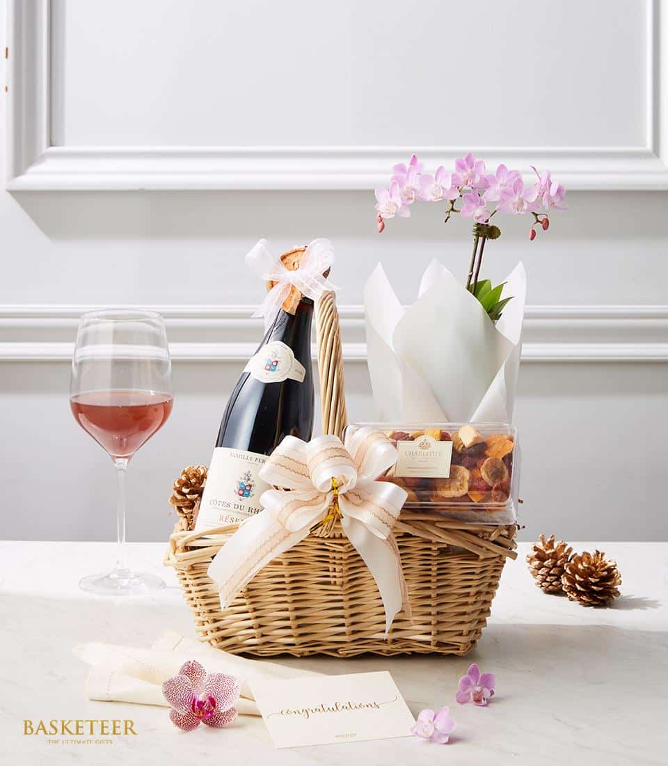 Experience tranquility with our Wine Orchid Serenity Basket and Dried Thai Fruits gift set. Delight in the soothing aroma of orchids paired with the exquisite taste of wine and the natural sweetness of dried Thai fruits.