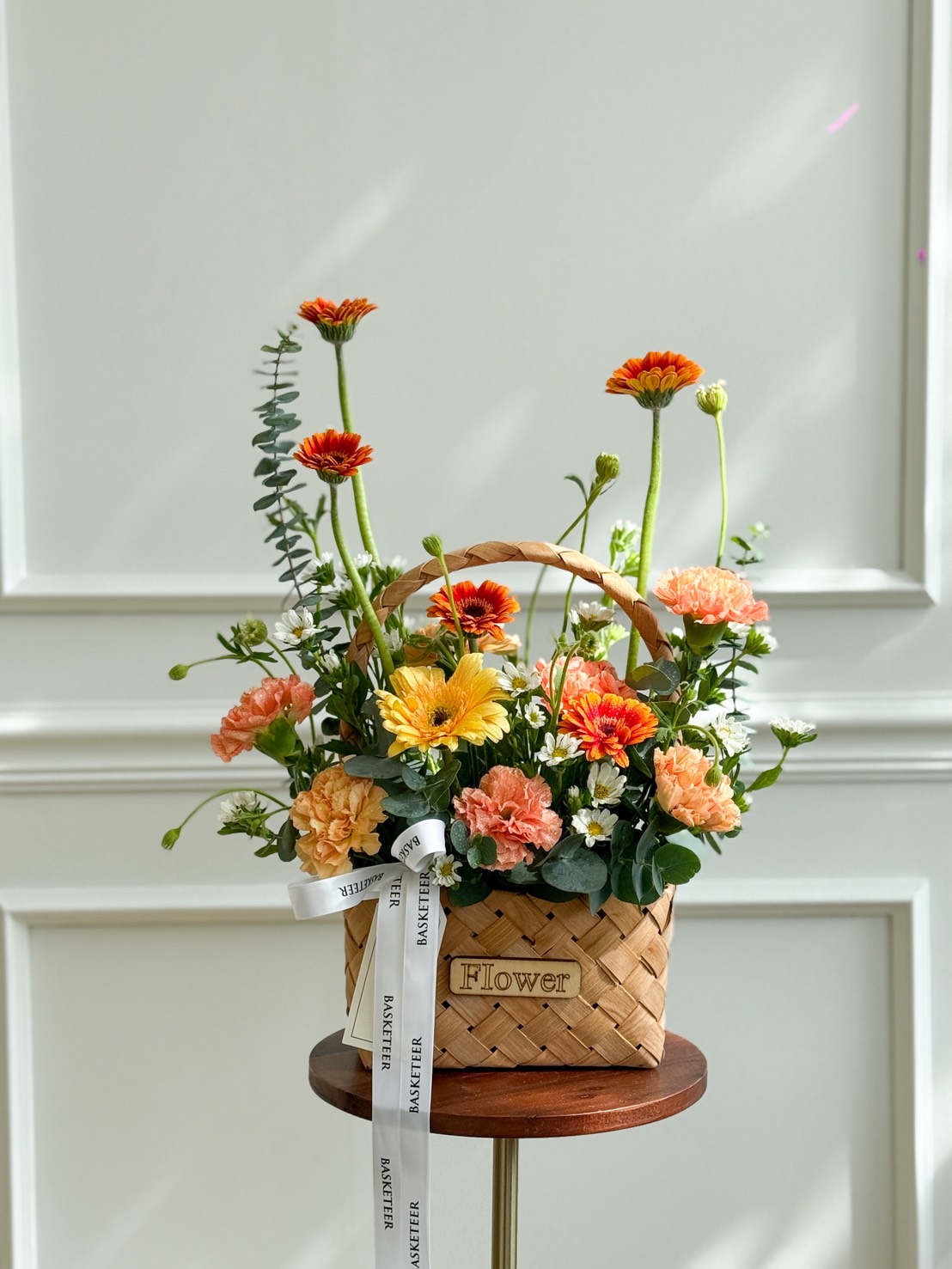 A woven basket labelled 