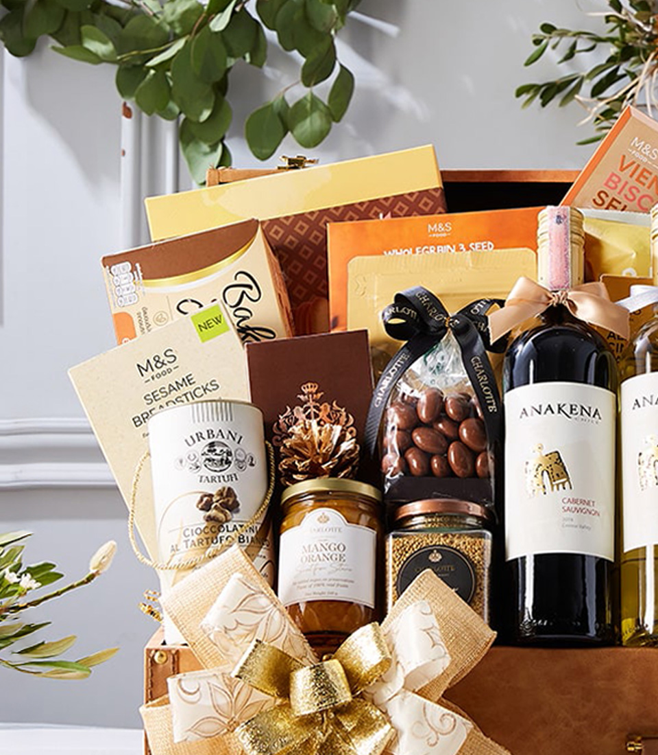 Indulge in luxury with our Deluxe Wine Duo in Leather Hamper with Gourmet Gift. This exquisite set features two bottles of premium wine nestled in a sophisticated leather hamper, accompanied by a selection of gourmet treats. Perfect for special occasions or treating someone special. Order now and elevate your gifting experience!