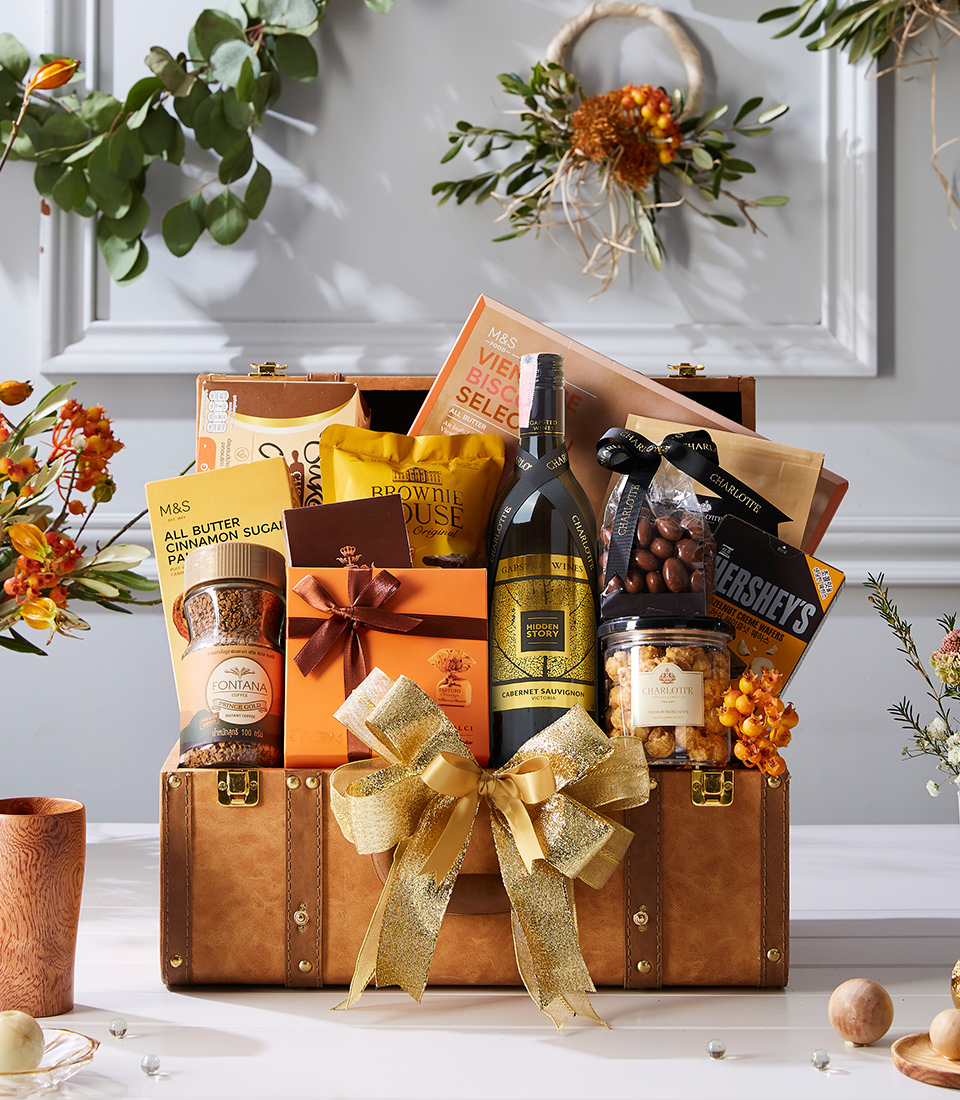 Immerse yourself in a symphony of flavors with our Wine Sweet Symphony Hamper. Featuring a curated selection of fine wines and delectable sweets, it's the perfect gift for any occasion!