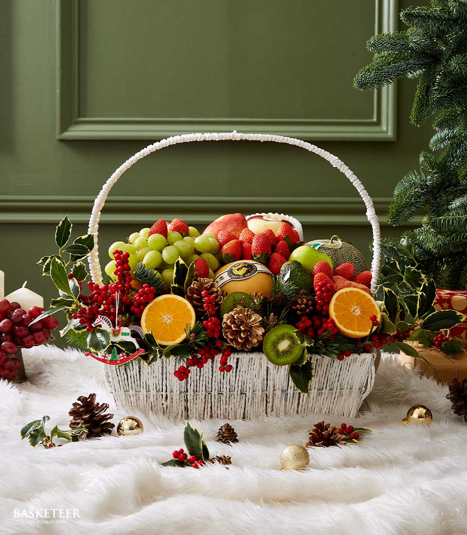 Mixed Fruits With Flowers Decoration In The White Basket