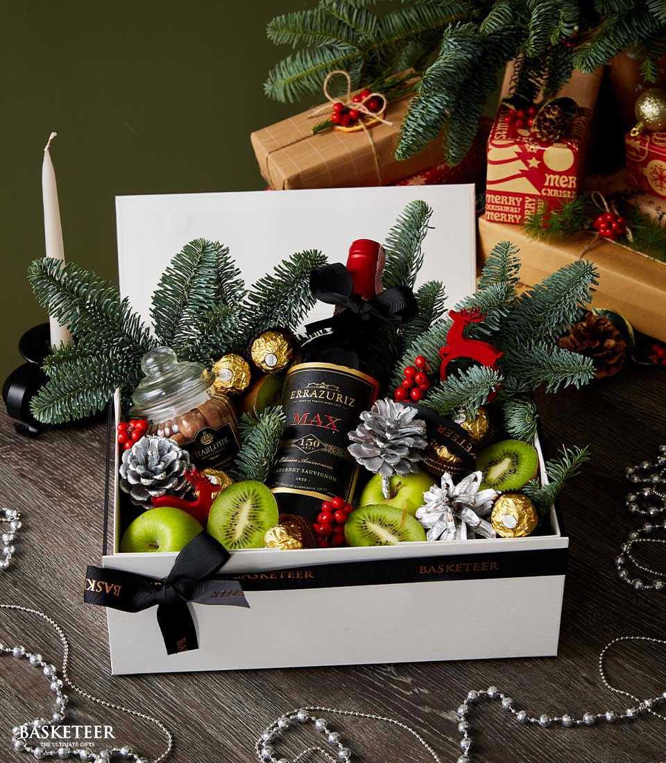 Explore our Merry Wine Festivity Box, a delightful collection of fine wines and festive treats. Perfect for any celebration.
