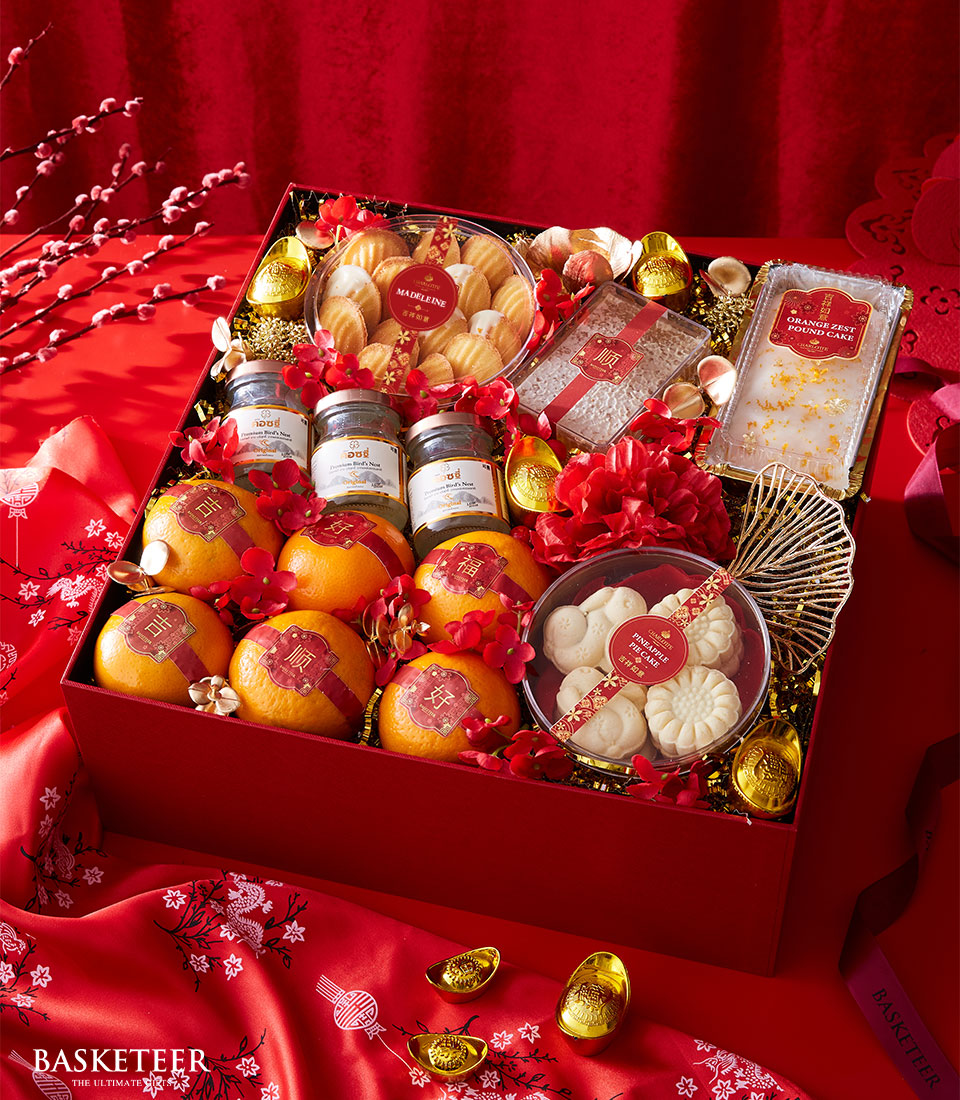 Joyful Beginnings: Festive Mandarin Oranges and Delightful Treats in Red Box