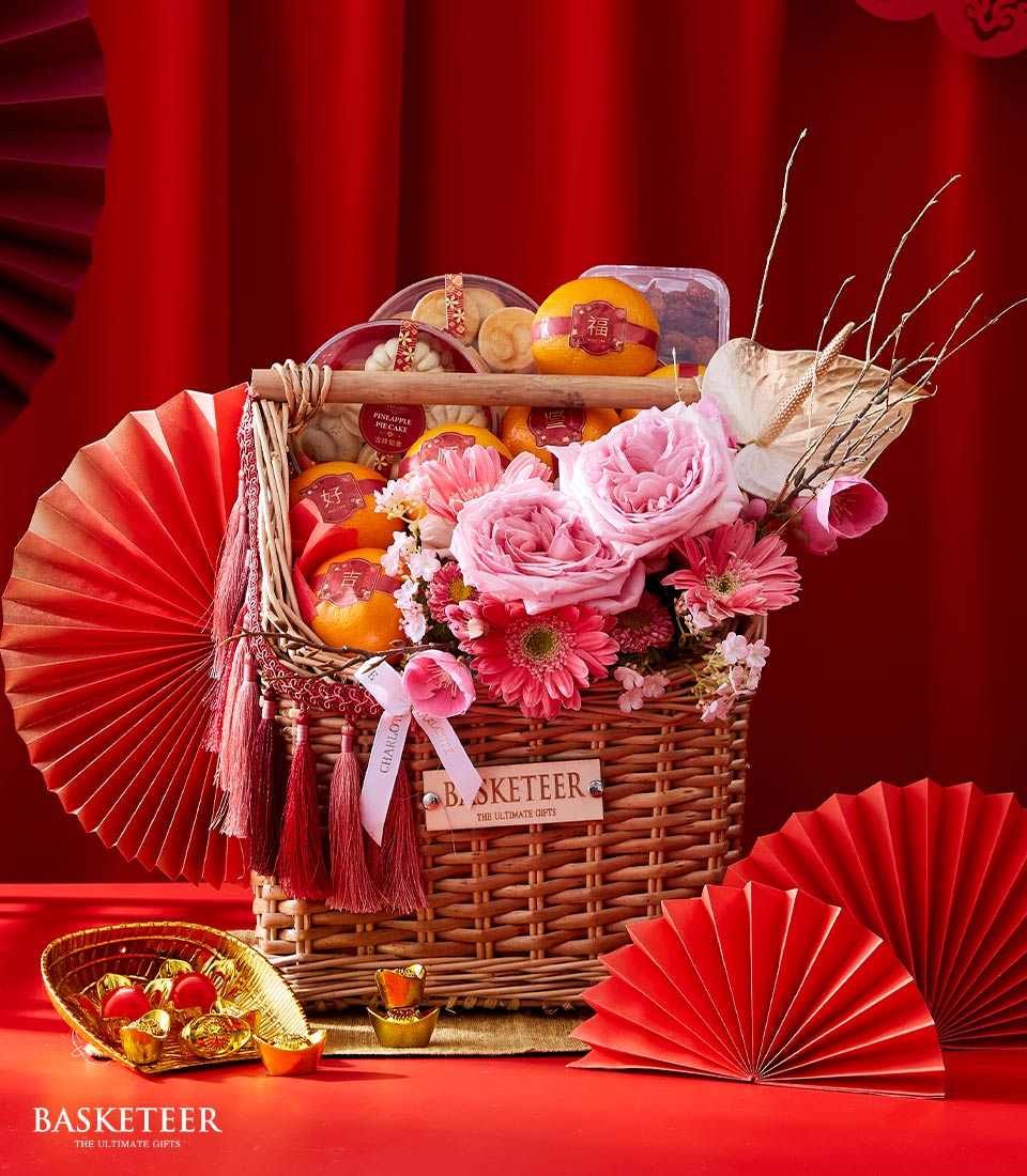Mandarin Orange And Cookies With Pink Flowers In The Basket, Chinese New Year