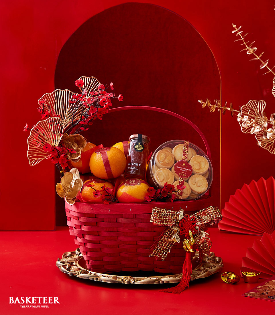 Chinese New Year Gift In Mandarin Orange With Cookie and Honey In The Red Basket We also Decorate it in Red and Gold.
