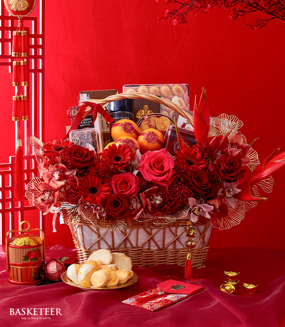 Mandarin Orange, Cookies, Tea, Blossom Madelines, Almond and Chocolate With Red Flowers Lunar New Year In The Basket