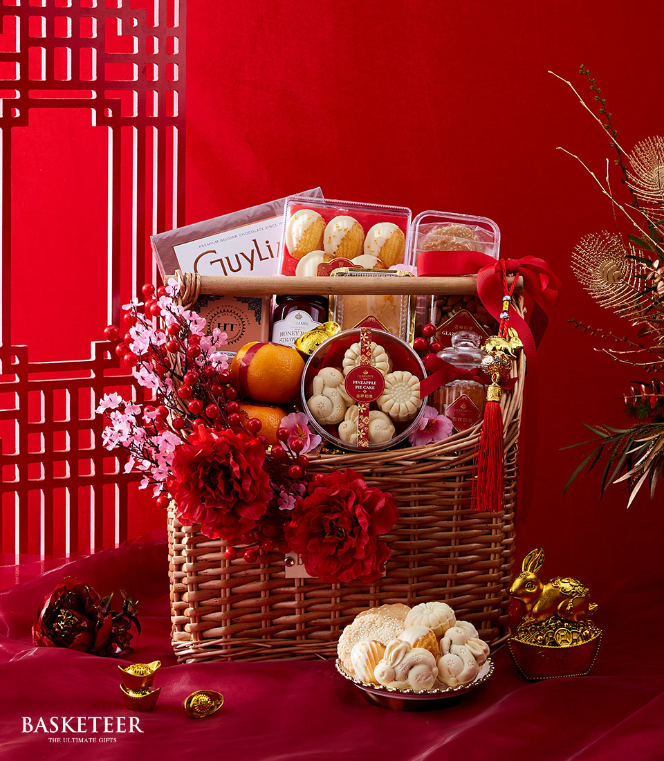 Mandarin Orange, Chocolate, Pineapple Cake, Almond, Cookies And Orange Zest Pound Cake With Flowers Decoration In The Hamper, Chinese New Year Gift