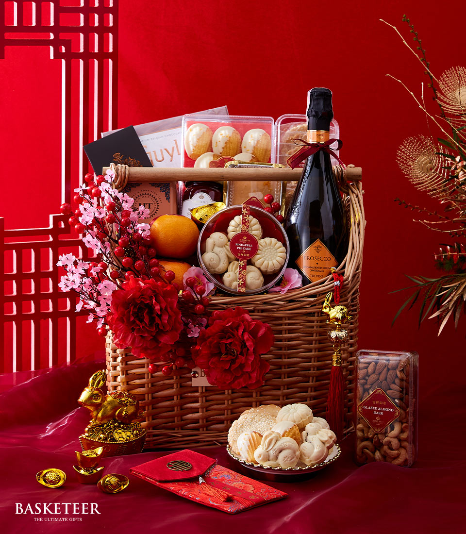 Wine , Mandarin Orange, Cookies, Chocolate, Pineapple Cake And Many With Flowers Decoration In The Basket, Chinese New Year Gift
