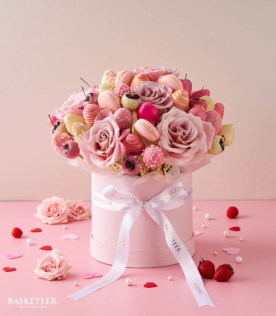 ndulge in our Sweet Pink Roses & Chocolate Strawberries Gift Box, featuring luscious pink roses and decadent chocolate-covered strawberries. Perfect for romantic occasions or heartfelt gestures. Order now and make someone's day sweeter!
