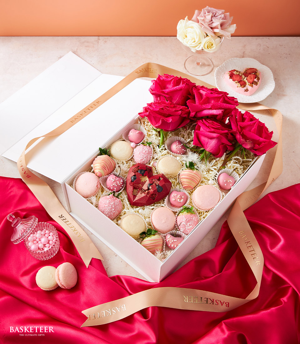 Indulge in our Mini Heart Chocolate & Sweet Strawberries Box Set featuring a delightful assortment of chocolate-covered strawberries, cherries, macarons, and fresh roses. Perfect for sharing love and sweetness on any occasion. Order now!