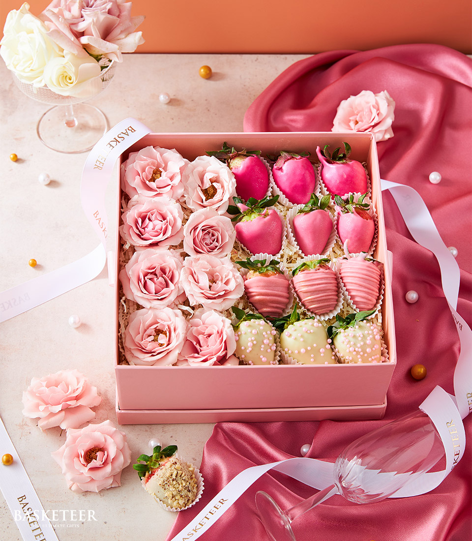 Discover our charming Soft Pink Roses & Chocolate Strawberries Gift Pink Box, a perfect blend of sweetness and elegance. Order now for a delightful surprise!