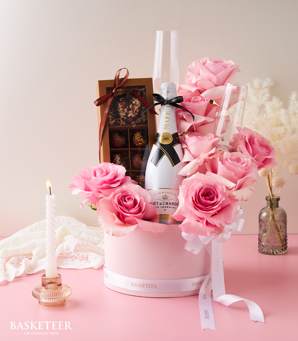 Indulge in elegance with our Wine & Chocolate Pink Roses Gift, featuring a delightful combination of wine, chocolates, and beautiful pink roses.