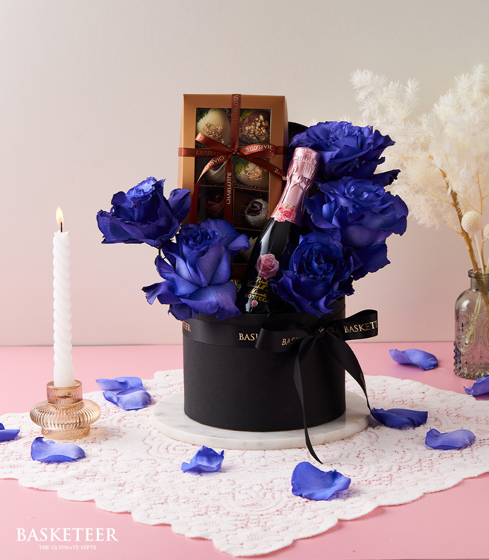 Valentine's day In Wine With Chocolate-Covered Cherries-Strawberries and Blue Roses In The Black Box with a Black Bow.