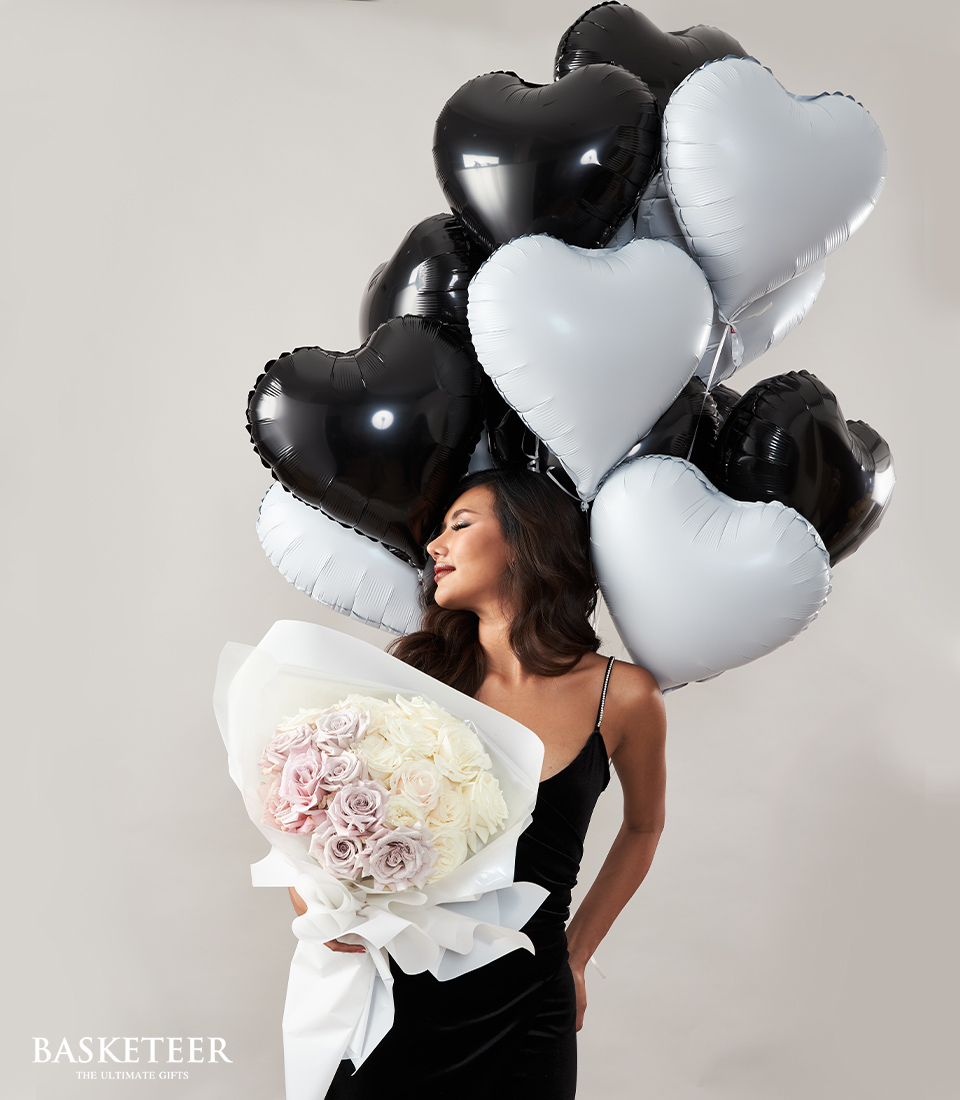 Explore our elegant Black-Gray Balloons & Sweet Roses Combo, ideal for birthdays, Valentine's Day, or any special occasion. Surprise your loved ones with this delightful gift set!