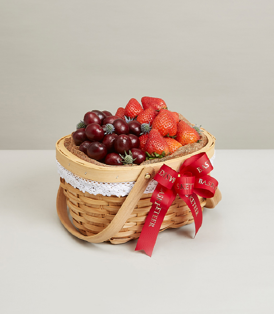 Experience the delightful blend of flavors with our Strawberry Berry Mix Basket. This gift features a selection of fresh strawberries and cherries, totaling two fruits, presented in a charming brown basket adorned with a vibrant red bow decoration. Perfect for any occasion, order now and treat your loved ones to a burst of fruity sweetness!