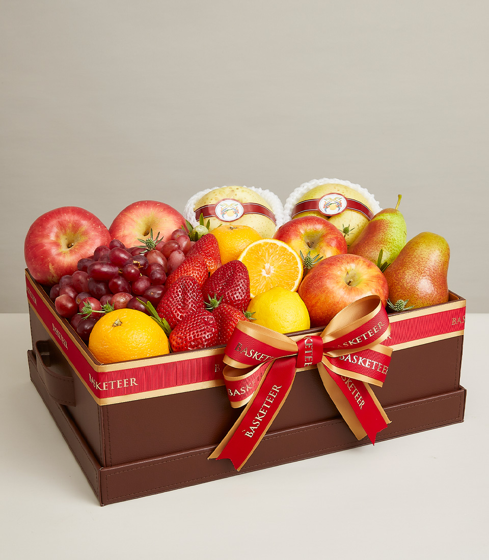 Indulge in our Mixed Fresh Fruits Bliss Gift Box, featuring a delightful selection of strawberries, Chinese pears, apples, Pears Riko, and more, totaling eight fruits. Presented in a charming brown basket adorned with a vibrant red bow decoration, this gift box is perfect for any occasion. Order now to share the bliss of fresh fruits with your loved ones!