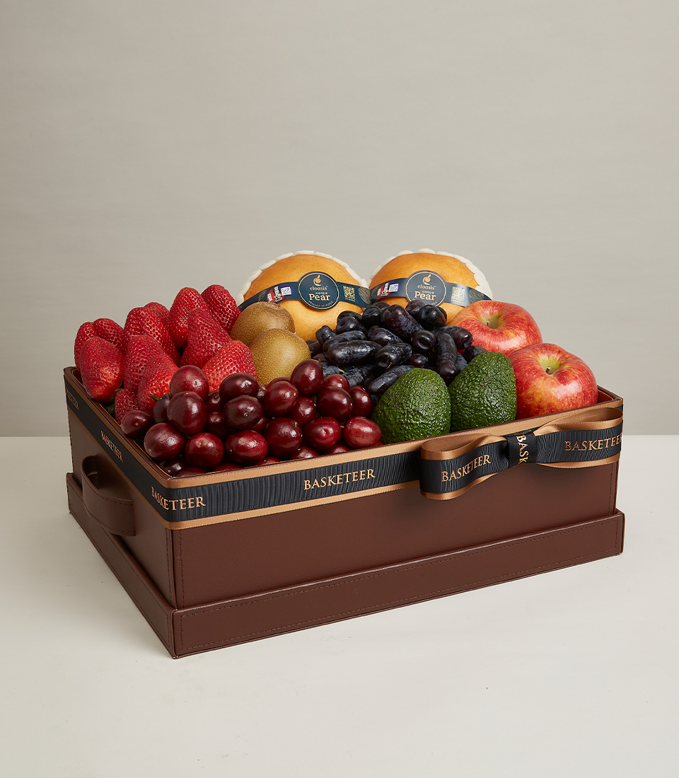 Discover luxury with our Exquisite Gourmet Fruit Gift Box, featuring a delectable assortment of fresh strawberries, Korean pears, creamy avocados, and more, totaling seven fruits. Presented in a charming brown basket with a vibrant red bow decoration, this gift is perfect for any occasion. Order now to delight your loved ones with a taste of gourmet elegance!