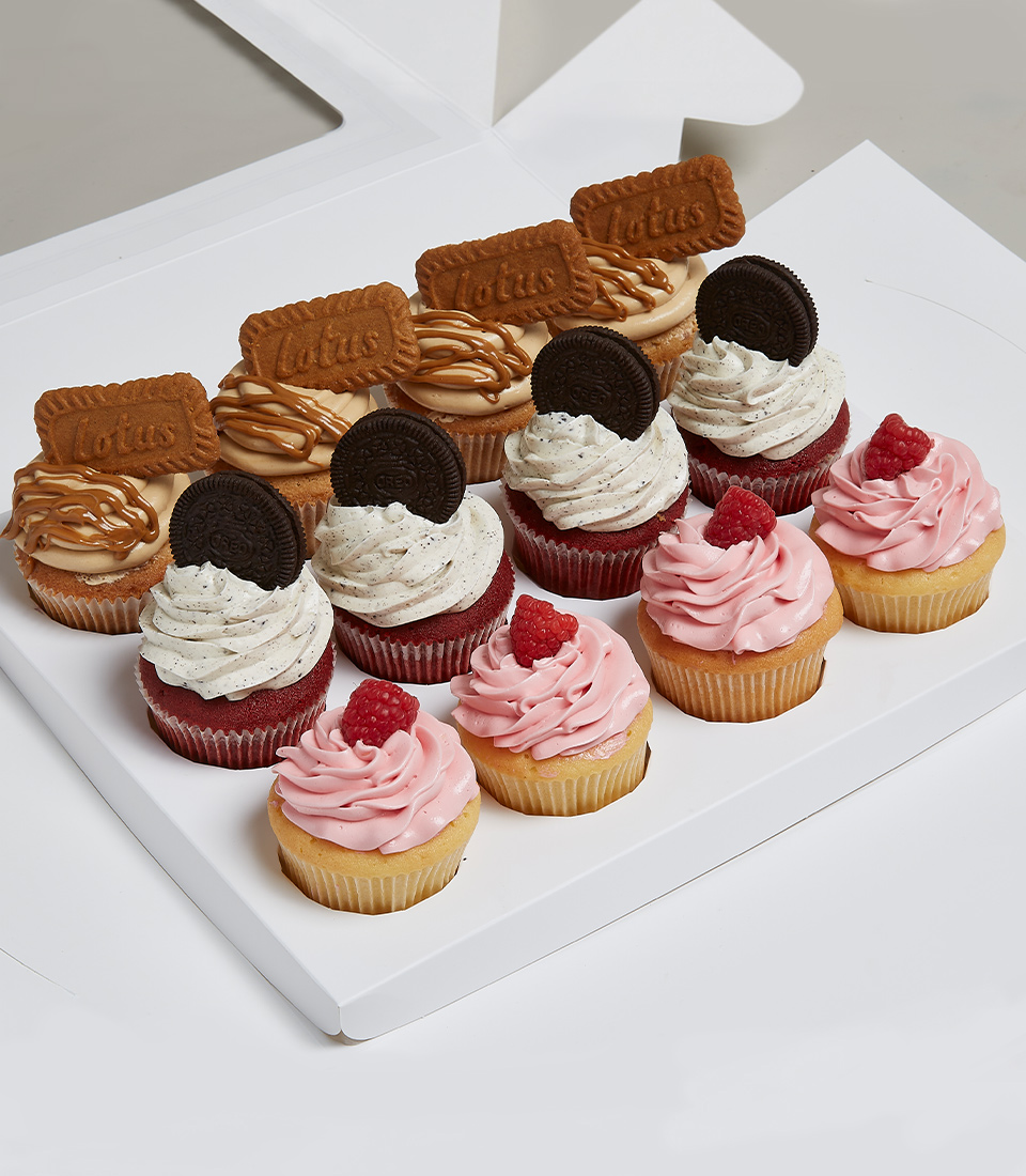 Rather Raspberry Jam Centred Cupcakes, Really Red Velvet Oreo Cupcakes, Signature Lotus Biscoff Biscuit Cupcakes .Tied with a white ribbon screenprinted with the Charlotte brand. Mix And Match Berry Selection Cupcakes. delivered express within 2 hours in Bangkok.
