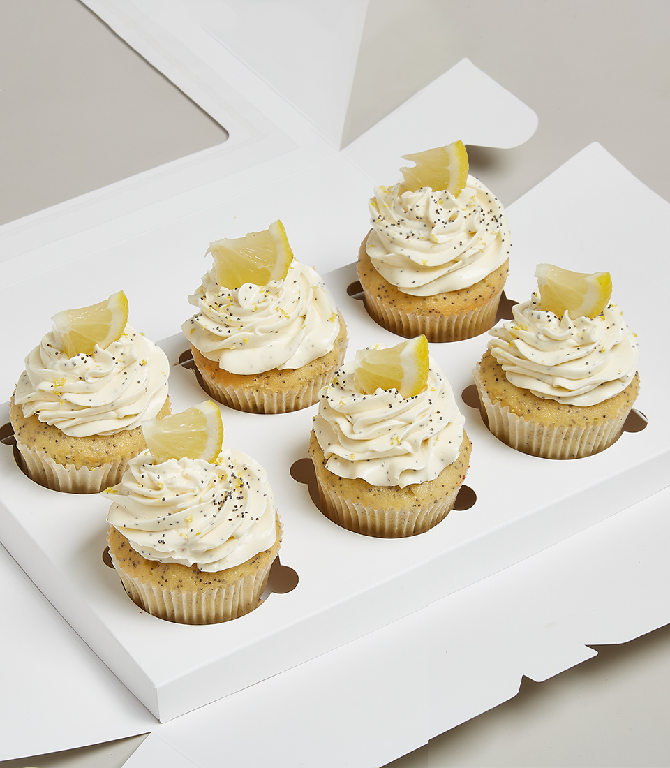 Meet the butter cake cupcakes. Topped with a light yellow cream that blends perfectly with lemon and the topping is filled with lemon. Express Delivery 2 Hr. Perfect Poppyseed And Lemon Curd Cupcakes