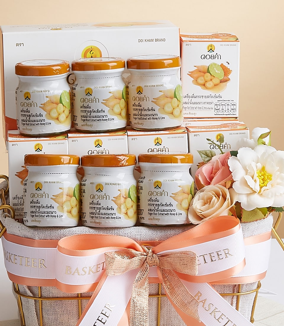 An elegant decorative basket graced with luxurious peach and white ribbons, featuring the distinguished 