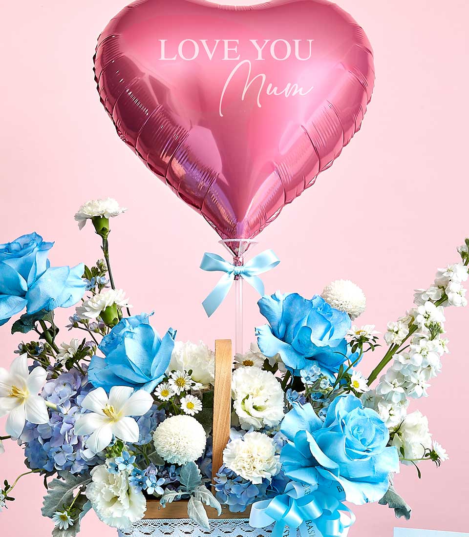 Heart-shaped pink balloon with 