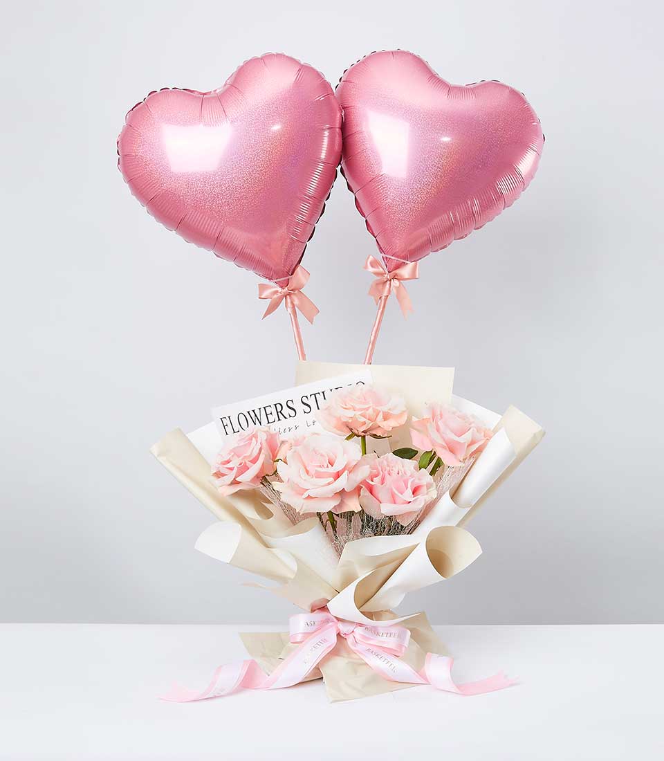 Brighten someone's day with our Pink Bouquet and Heart Balloon Set. Perfect for birthdays or any special occasion, this delightful set features a beautiful bouquet of pink flowers accompanied by a heart-shaped balloon. Spread love and joy with this charming gift. Order now!