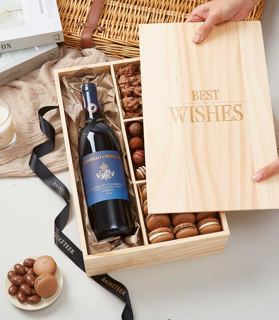 A luxurious wooden gift box adorned with the elegant engraving 