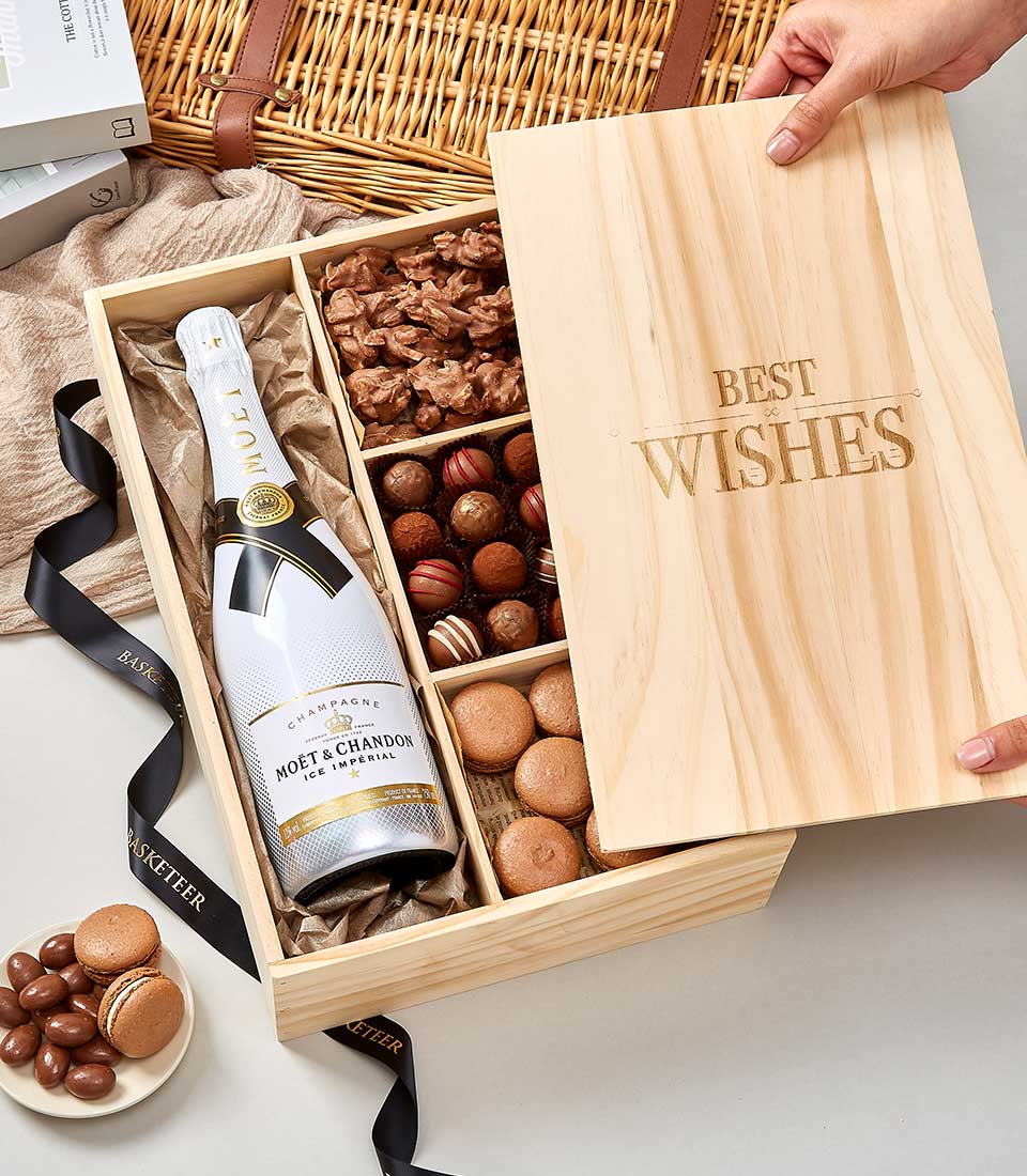 A wooden box, elegantly engraved with 