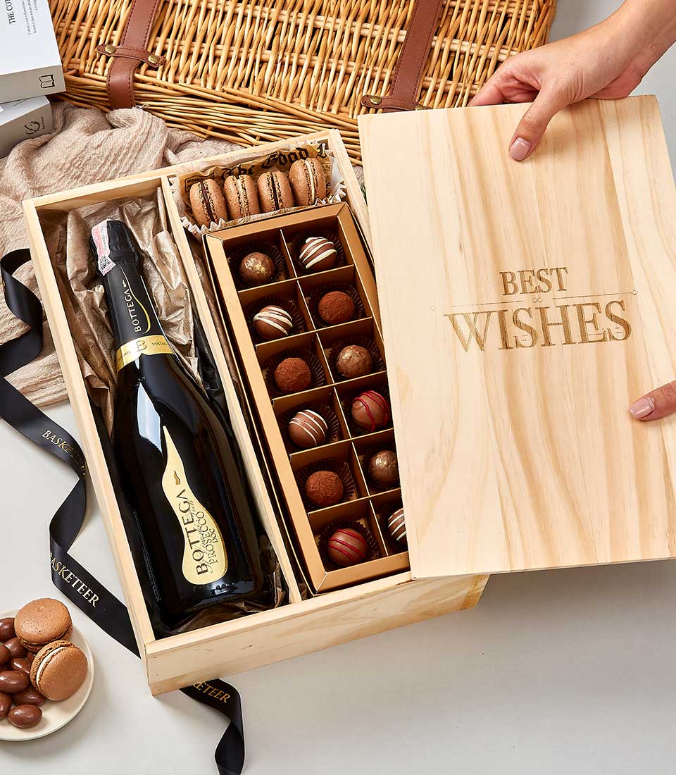 A luxurious wooden gift box adorned with the inscription 