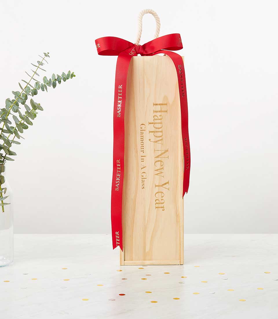 A luxurious wooden gift box, elegantly engraved with 